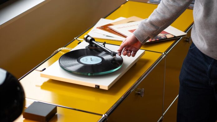 A turntable with a person