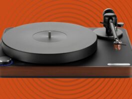 The Clearaudio Concept Signature against an orange background