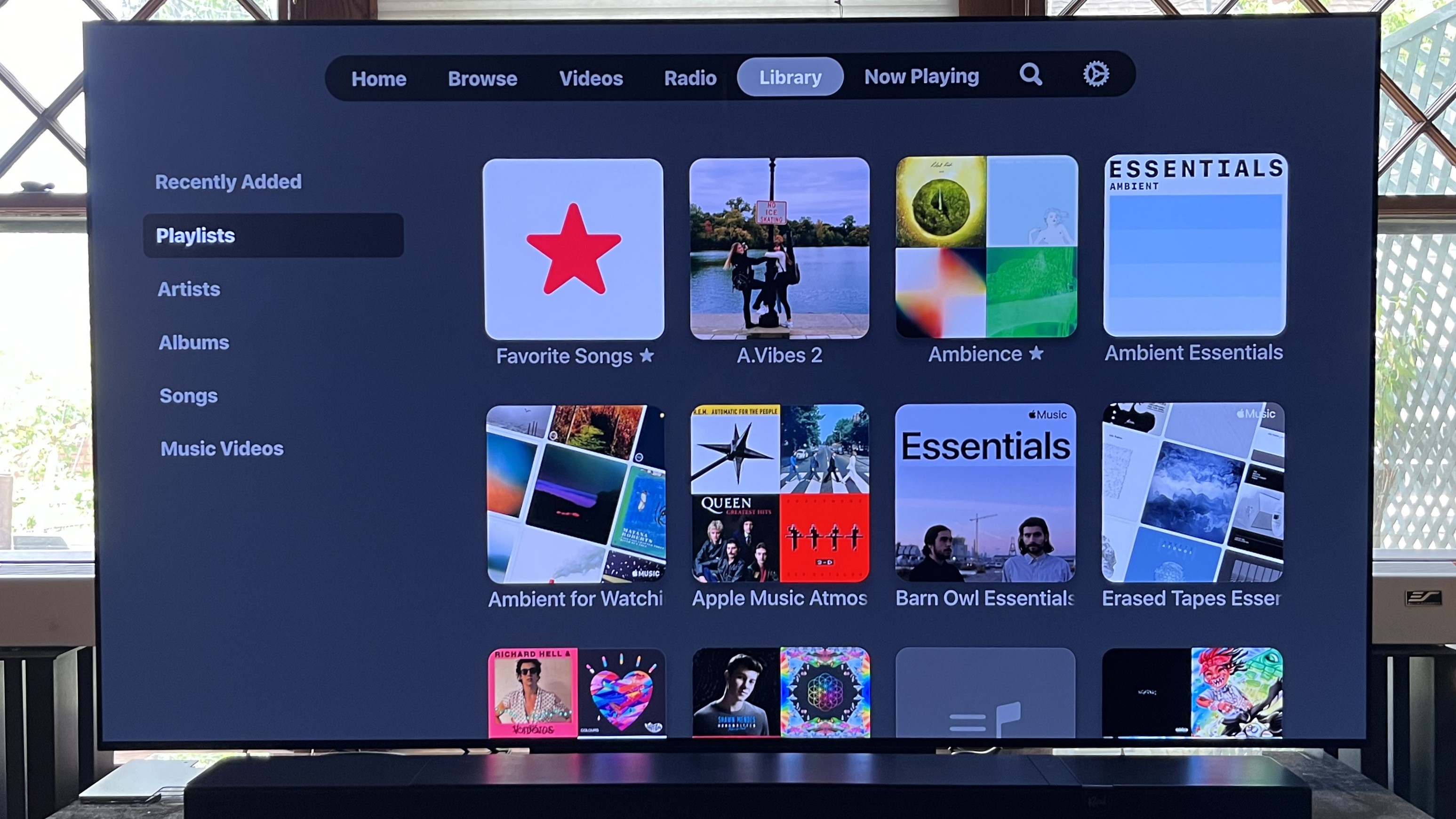 LG C4 OLED TV showing Apple Music app onscreen